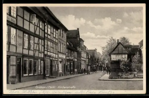 AK Grabow /Meckl., Kirchenstrasse mit Geschäften