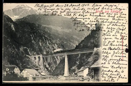 AK Amsteg, Ortspartie mit Eisenbahnbrücke