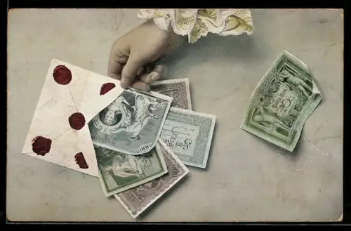 AK Hand hält einen Umschlag mit versch. Geldscheinen