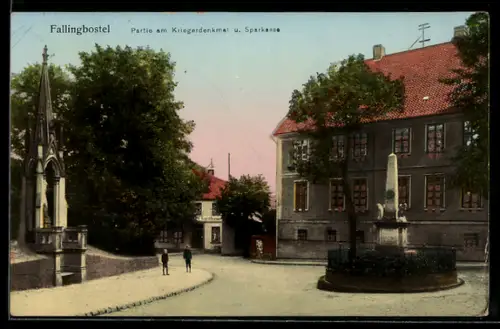 Goldfenster-AK Fallingbostel, Kriegerdenkmal u. Sparkasse mit leuchtenden Fenstern