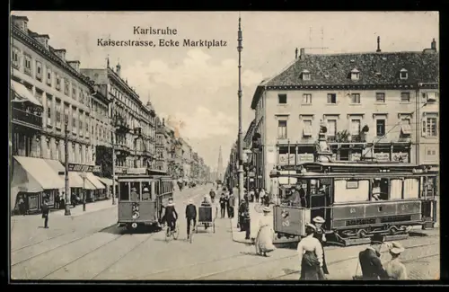 AK Karlsruhe, Strassenbahnen am Marktplatz, Geschäft von Adolf Stein