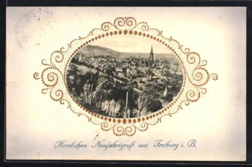 Präge-AK Freiburg i. B., Ortsansicht mit Münster, Ornament-Rahmen