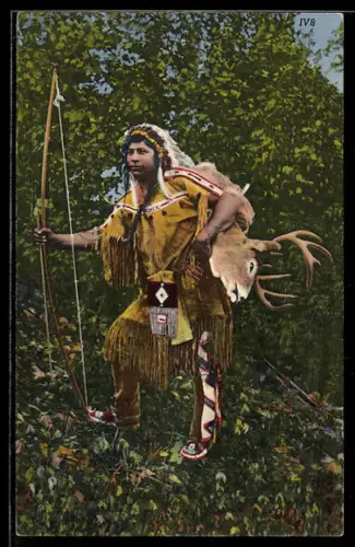 AK Native American with a bow returning from the hunt