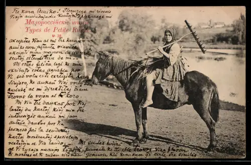 AK Bäuerin auf einem Pferd sitzend