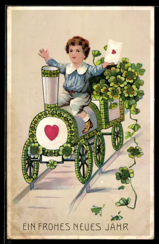 AK Junge fährt auf einer Eisenbahn aus Kleeblättern, Neujahrsgruss