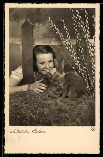 AK Kind bei zwei Osterhasen
