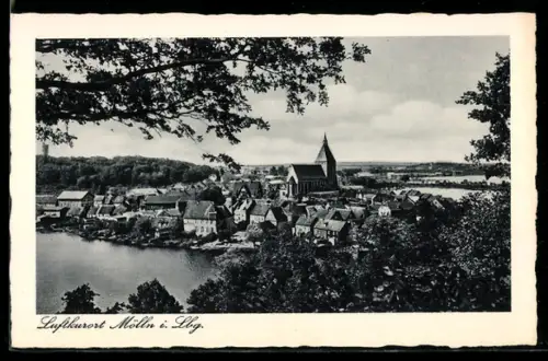 AK Mölln i. Lbg., Stadtansicht mit Kirche und See