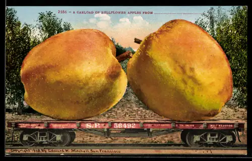 AK Zwei riesige Äpfel auf einem Schienenwagen