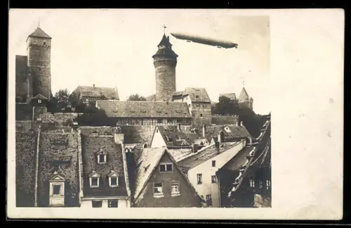Foto-AK Nürnberg, Zeppelin über der Stadt
