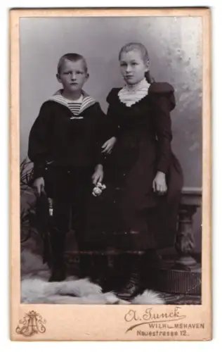 Fotografie A. Junck, Wilhelmshaven, Neustrasse 12, Porträt von Geschwistern in eleganter Kleidung