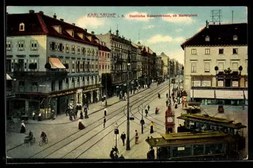 AK Karlsruhe i. B., Oestliche Kaiserstrasse ab Marktplatz mit Geschäften und Strassenbahn