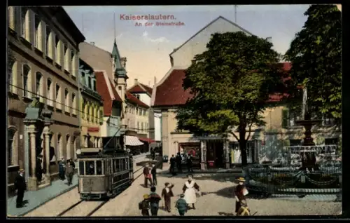 AK Kaiserslautern, An der Steinstrasse mit Geschäften, Brunnen und Strassenbahn