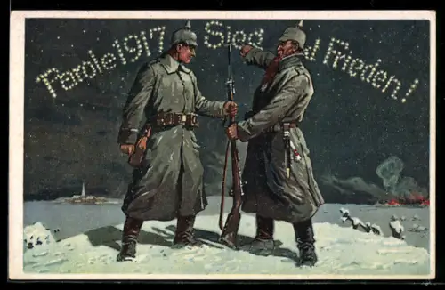 AK Zwei Soldaten im Schnee, die Parole 1917: Sieg Frieden!
