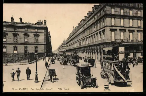 AK Paris, La Rue de Rivoli animée avec voitures et piétons