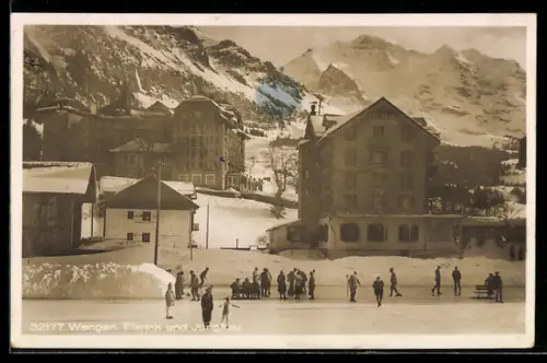 AK Wengen, Eisrink und Jungfrau, Ortspartie mit Schlittschuhläufern