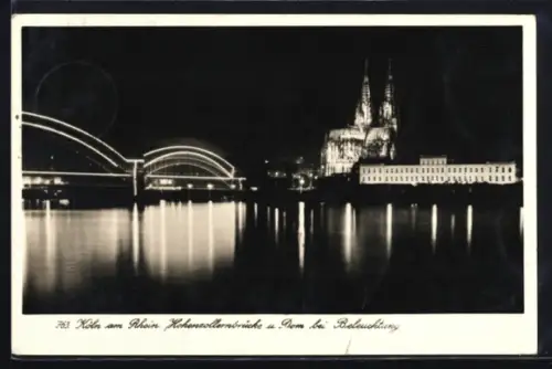 AK Köln am Rhein, Hohenzollernbrücke und Dom bei Beleuchtung