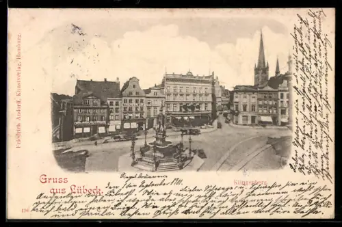 AK Lübeck, Strasse am Klingenberg mit Geschäften und Brunnen