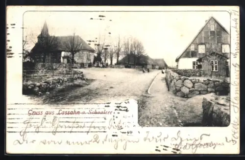 AK Lassahn a. Schaalsee, Strassenpartie mit Kirche