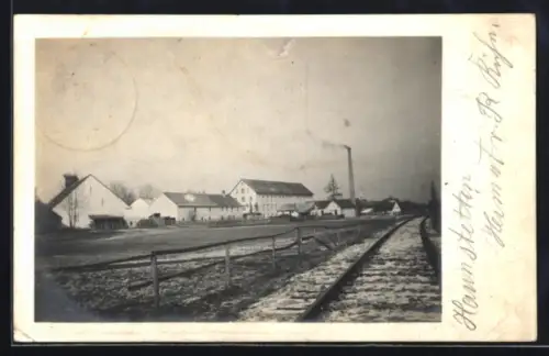 AK Haunstetten, Strassenpartie mit Bahngleis im Winter