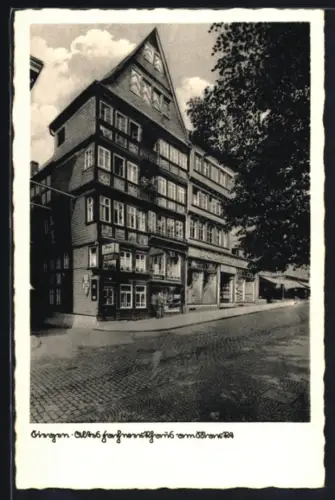 AK Siegen, Altes Fachwerkhaus mit Geschäften am Markt