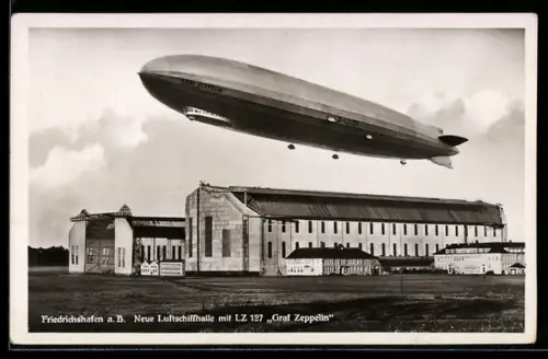 AK Friedrichshafen a. B., der Zeppelin 127 vor der neuen Luftschiffhalle