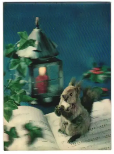 3D-AK Eichhörnchen mit Nuss steht auf einem Notenbuch