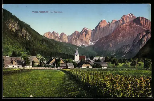 AK Wolfsbach /Kärnten, Dorf mit Kirche und Bergpanorama