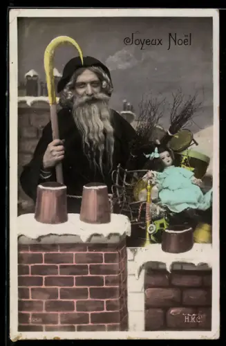 AK Weihnachtsmann mit Geschenken auf dem Dach eines Hauses