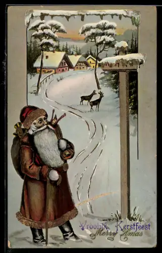 AK Weihnachtsmann vor einem verschneiten Ort