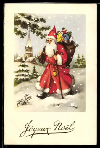 AK Weihnachtsmann trägt Sack mit Geschenken durch den Schnee