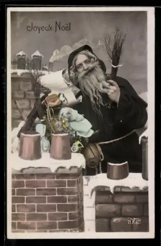 AK Weihnachtsmann steht neben dem Schornstein und liest den Wunschzettel eines Kindes, Joyeux Noel