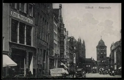 AK Lübeck, Partie in der Burgstrasse mit Geschäft Emil Seidel & Co.