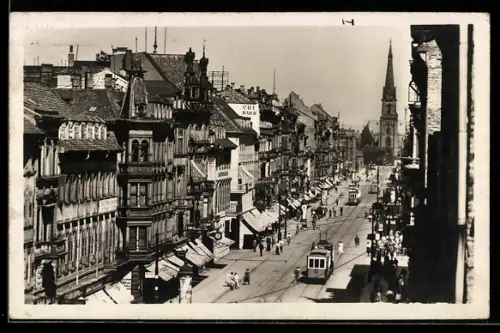 AK Karlsruhe, Partie in der Kaiserstrasse mit Strassenbahn und Blick auf Kirche