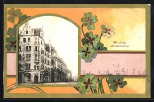 Grusskarten-AK Würzburg, Partie in der Schönbornstrasse mit Kleeblättern im Passepartout