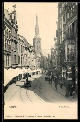 AK Lübeck, Breitestrasse mit Geschäften und Kirche