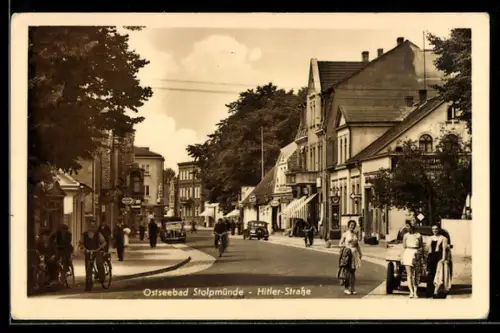 AK Stolpmünde, Strasse mit Geschäften