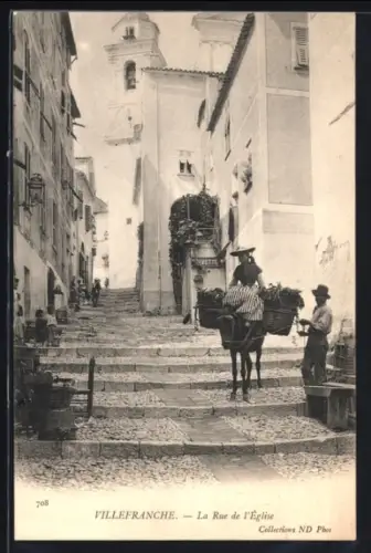 AK Villefranche, La Rue de l`Église avec un âne chargé de paniers