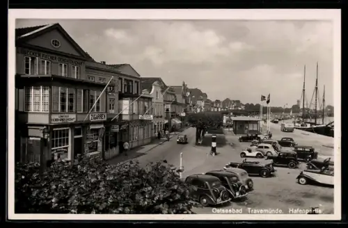 AK Travemünde, Ostseebad, Hafenpartie mit Geschäften