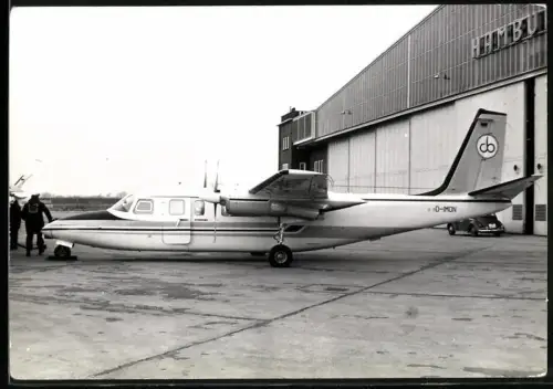 Fotografie Flughafen Hamburg, Flugzeug Aero Commander, Kennung D-IMON vor Hangar stehend