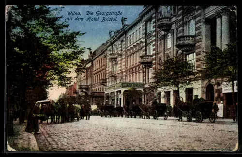 AK Wilna, Georgstrasse mit Hotel Bristol, Kutschen