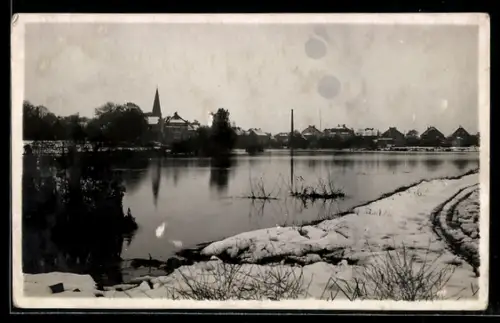 Foto-AK Bünde, Else-Hochwasser, Überfluteter Ort mit Kirche im Schnee