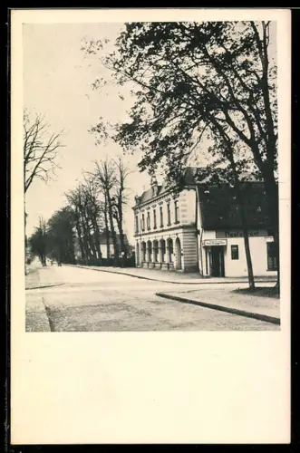 AK Varel i. O., Strassenpartie mit Restaurant und Kreuzung, Besuchsankündigung Vertreter Alfred Bruhnken