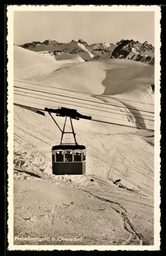 AK Oberstdorf, Nebelhornbahn über einem Schneefeld