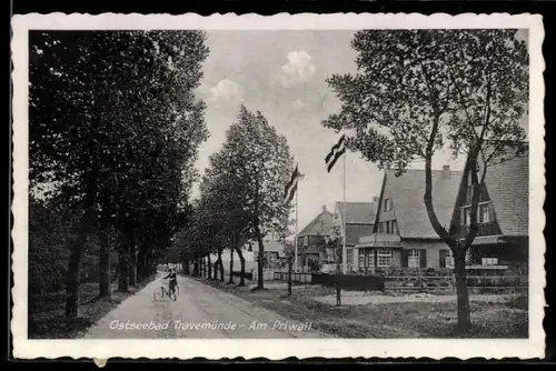 AK Travemünde, Am Priwall, Strassenansicht, Häuser, Bäume