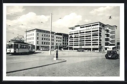 AK Kiel, Holstenbrücke mit Strassenbahnen u. Weipert-Haus