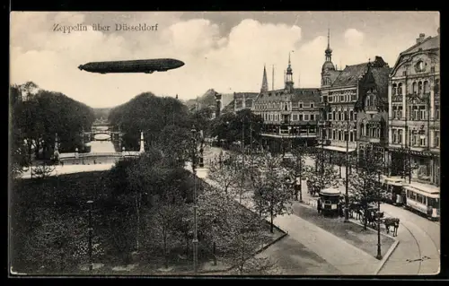 AK Düsseldorf, Zeppelin im Flug über einem Stadtteil