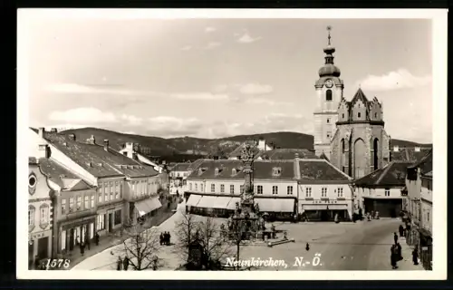 AK Neunkirchen /N.-Ö., Geschäft Joh. Paur, Blick zur Kirche