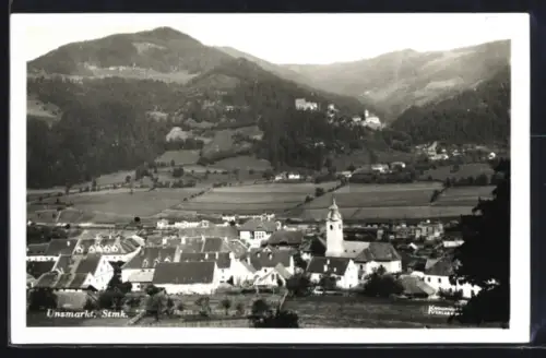 AK Unzmarkt /Stmk., Panorama mit Kirche und Bergen