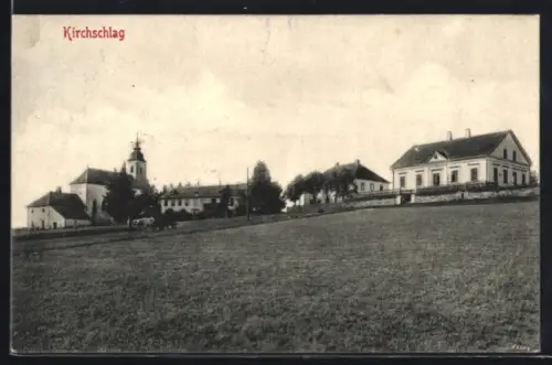 AK Kirchschlag, Panorama mit Kirche und Häusern