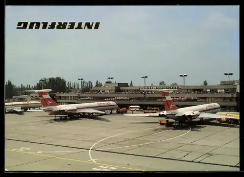 AK Berlin-Schönefeld, Flughafen mit Passagierflugzeugen der Interflug am Hauptgebäude